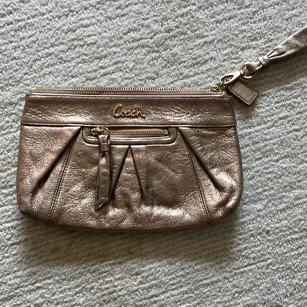 Coach gold/rose gold wristlet
